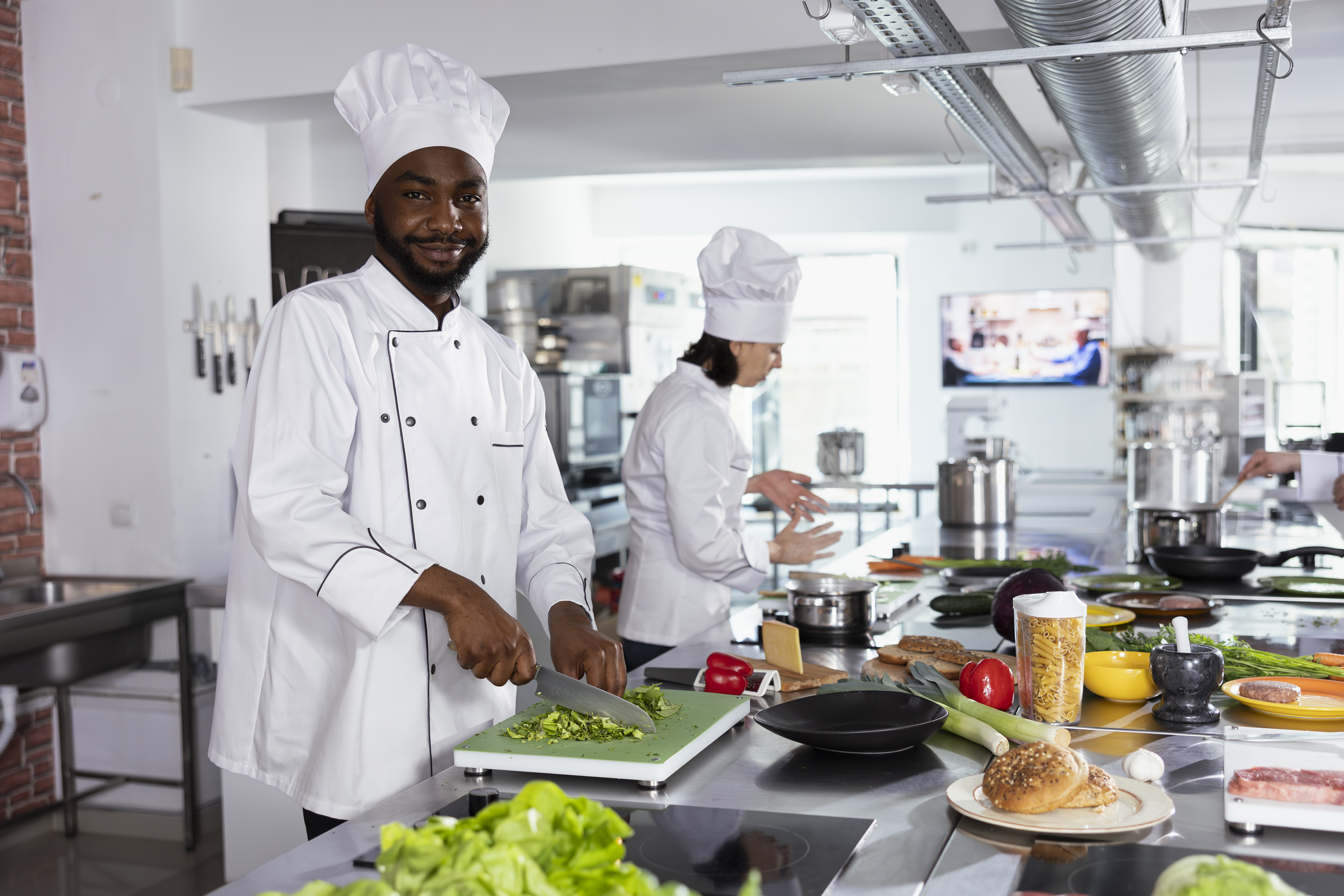 Restaurant chef chopping veggies